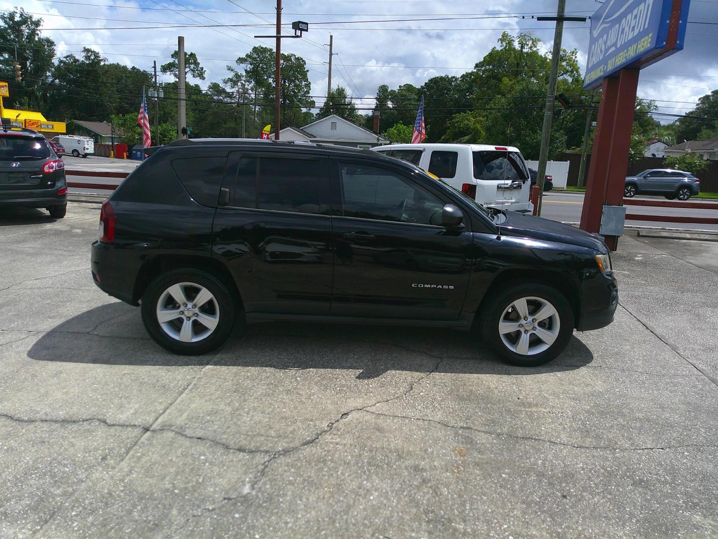 2015 BLACK JEEP COMPASS SPORT (1C4NJDBB0FD) , located at 1200 Cassat Avenue, Jacksonville, FL, 32205, (904) 695-1885, 30.302404, -81.731033 - Photo#4